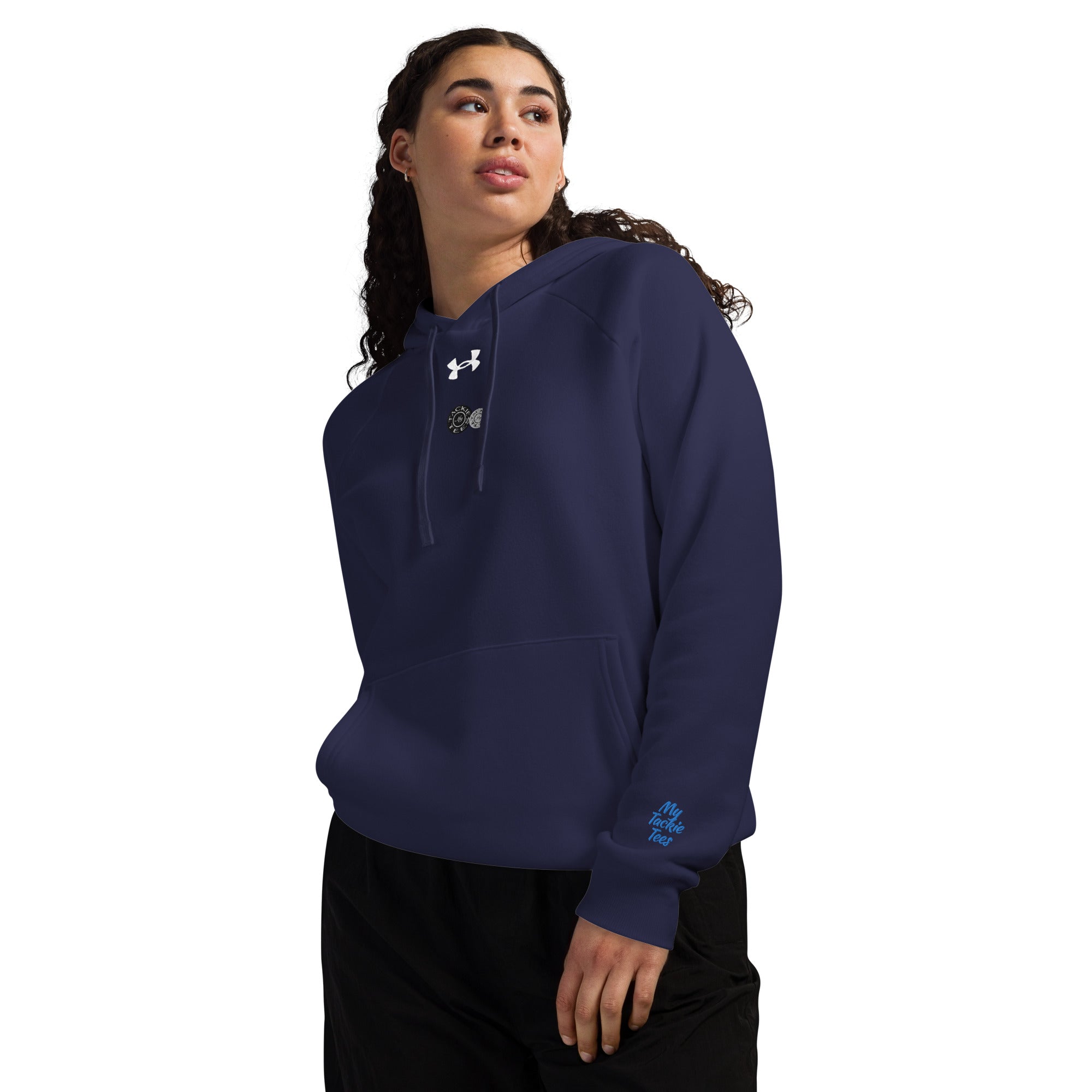 Woman wearing Under Armour x Signature embroidered hoodie in navy blue, showcasing soft fleece material and relaxed fit for athletic or casual wear.